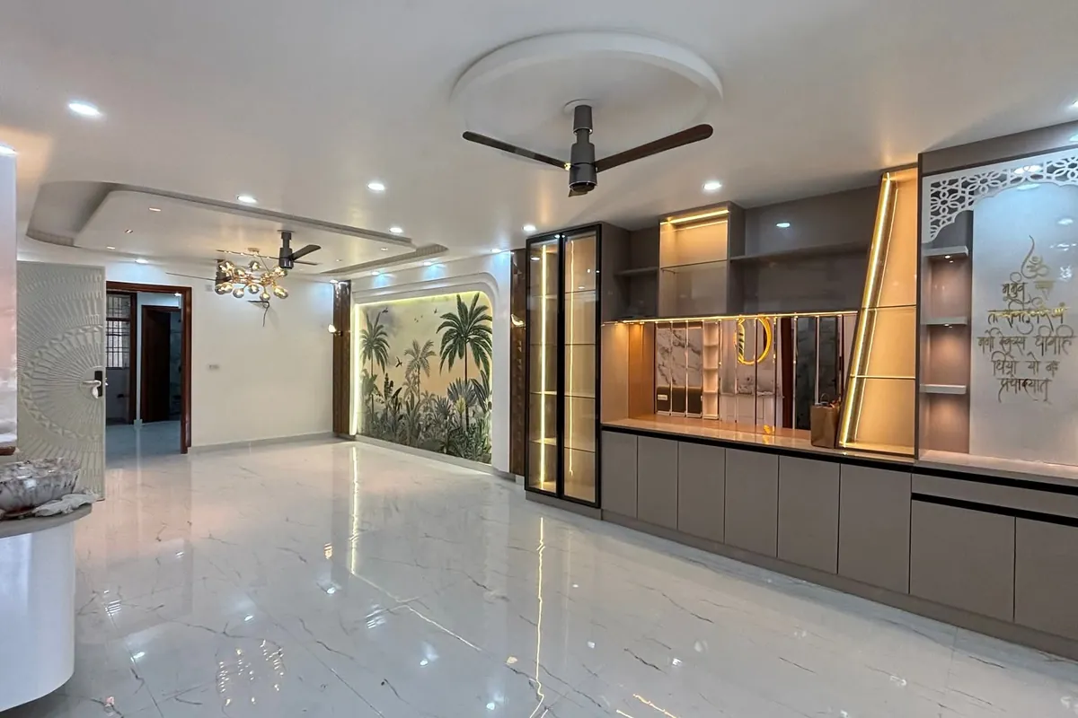 Finished living area with a tropical wall mural, glass display units and a polished marble-look floor